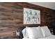 Close-up of a decorative wood panel wall in bedroom with stylish decor at 7686 Micawber Ct, Indianapolis, IN 46256