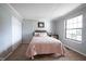 Comfortable bedroom with soft carpet, window, and closet space at 7686 Micawber Ct, Indianapolis, IN 46256