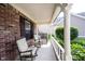 Welcoming front porch with rocking chairs and a cozy atmosphere, great for relaxing outside at 7686 Micawber Ct, Indianapolis, IN 46256