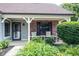 Cozy front porch with comfortable rocking chairs, perfect for relaxing and enjoying the outdoors at 7686 Micawber Ct, Indianapolis, IN 46256