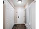 Hallway with closet and door that leads to the outside at 7686 Micawber Ct, Indianapolis, IN 46256