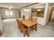 Dining area open to living room and kitchen featuring an open concept floor plan at 7687 Sea Crest N Way, Noblesville, IN 46062