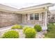 Inviting front entrance with charming landscaping and a covered porch at 7687 Sea Crest N Way, Noblesville, IN 46062