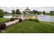 Gazebo on a pond with landscaped surroundings, offering a peaceful community amenity at 7687 Sea Crest N Way, Noblesville, IN 46062