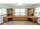 Home office featuring custom cabinetry, and a window allowing natural light at 7687 Sea Crest N Way, Noblesville, IN 46062