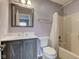 This bathroom features a single vanity, a toilet, and a shower and tub combination at 7918 Bitternut Dr, Indianapolis, IN 46236