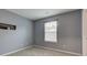 Bedroom featuring carpet flooring, natural light, and neutral walls at 7918 Bitternut Dr, Indianapolis, IN 46236