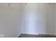 Walk-in closet with white walls and carpeted flooring has ample storage at 7918 Bitternut Dr, Indianapolis, IN 46236