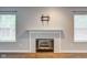 Fireplace in a living room with a clean, modern design at 7918 Bitternut Dr, Indianapolis, IN 46236