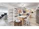 Well-equipped kitchen featuring an island with seating and stainless steel appliances at 852 Yellowwood Dr, Greenwood, IN 46143