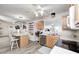 Spacious eat-in kitchen with wood cabinets, stainless steel appliances, and an island is perfect for cooking and entertaining at 852 Yellowwood Dr, Greenwood, IN 46143