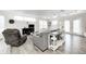 Spacious living room with hardwood floors, a ceiling fan, and neutral decor creates a bright and welcoming atmosphere at 852 Yellowwood Dr, Greenwood, IN 46143