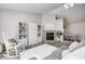 Inviting living room featuring a fireplace, rocking chair, and white cabinets at 852 Yellowwood Dr, Greenwood, IN 46143