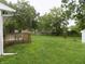 Inviting backyard with a wooden deck perfect for relaxation and outdoor gatherings at 8609 Stonewall Dr, Indianapolis, IN 46231