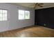 An open living room with natural light and access to the outdoors at 8609 Stonewall Dr, Indianapolis, IN 46231