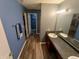 Bathroom with a double vanity, and a closet and shower in the background at 878 Sommersweet Run, Greenwood, IN 46143