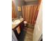 Cozy bathroom features a vanity sink, toilet, and shower with a curtain, perfect for everyday needs at 878 Sommersweet Run, Greenwood, IN 46143