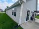 Side view of home highlighting the low-maintenance yard and access to the patio at 878 Sommersweet Run, Greenwood, IN 46143