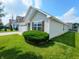 Charming home exterior featuring manicured landscaping and a well-maintained lawn at 878 Sommersweet Run, Greenwood, IN 46143