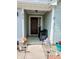 Charming front porch with a seating area and decorative elements, creating a welcoming entrance at 878 Sommersweet Run, Greenwood, IN 46143