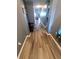 Hallway with hard surface floors and a peek into the living space at 878 Sommersweet Run, Greenwood, IN 46143