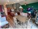 Open-concept kitchen, dining, and living area, creating a spacious and inviting atmosphere for entertaining at 878 Sommersweet Run, Greenwood, IN 46143