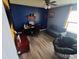 Living room featuring desk, chair, sofa, and gray papasan chair at 878 Sommersweet Run, Greenwood, IN 46143