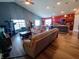 Open concept living area with view into the kitchen and dining area at 878 Sommersweet Run, Greenwood, IN 46143