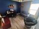Living room featuring desk, chair, sofa, and gray papasan chair at 878 Sommersweet Run, Greenwood, IN 46143
