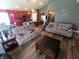 Comfortable living room showcases a view into the kitchen and dining area at 878 Sommersweet Run, Greenwood, IN 46143