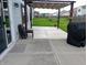 Backyard patio with pergola providing shade, perfect for outdoor dining and lounging at 878 Sommersweet Run, Greenwood, IN 46143