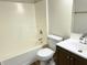 Small bathroom with a combination shower and tub, and a dark wood vanity at 883 Halyard Dr, Avon, IN 46123