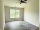 Bright bedroom featuring wood grain flooring and a ceiling fan at 883 Halyard Dr, Avon, IN 46123