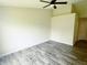 Bright bedroom featuring wood grain flooring and a ceiling fan at 883 Halyard Dr, Avon, IN 46123