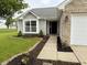 Well-kept home boasting a manicured lawn, beautiful landscaping, and an attached two-car garage at 883 Halyard Dr, Avon, IN 46123