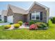 Beautiful brick home with manicured landscaping at 9001 Fitzgerald Dr, Indianapolis, IN 46239