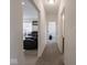 Hallway connecting to the living room and bedrooms, with carpet flooring at 9001 Fitzgerald Dr, Indianapolis, IN 46239