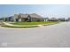 A brick house with a well-manicured lawn situated in a suburban neighborhood at 9001 Fitzgerald Dr, Indianapolis, IN 46239