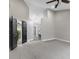 Large main bedroom boasts high ceilings, with black doors and a peak into the attached bath at 9148 Oak Knoll Ln, Fishers, IN 46037