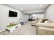 Basement featuring neutral walls, carpet, a flatscreen television, and gym/play equipment at 10717 Windermere Blvd, Fishers, IN 46037