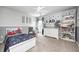 bedroom showcasing neutral paint, a ceiling fan, a white bed, and lots of room to play at 10717 Windermere Blvd, Fishers, IN 46037