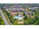 Overhead shot of a community pool, tennis and basketball courts, and playground near comfortable apartment homes at 10717 Windermere Blvd, Fishers, IN 46037