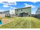 Lush backyard with deck, patio and gazebo offers relaxation and entertainment opportunities at 10902 Jimmy Lake Dr, Indianapolis, IN 46239
