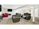 Finished basement featuring soft gray carpet, a TV area, fireplace, and comfortable seating for relaxation at 10902 Jimmy Lake Dr, Indianapolis, IN 46239