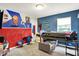 This bedroom boasts a fun superhero theme and features a bunk bed perfect for  at 10902 Jimmy Lake Dr, Indianapolis, IN 46239