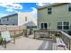 Back deck offers outdoor relaxation and enjoyment with a view of the yard and the neighbor's house at 10902 Jimmy Lake Dr, Indianapolis, IN 46239