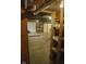 Large unfinished basement provides opportunity for storage and renovation at 1115 N Kealing Ave, Indianapolis, IN 46201