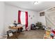 Bedroom with a table, bright window, and ample space at 1116 N Berwick Ave, Indianapolis, IN 46222