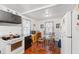 Bright kitchen with glass table seating area, dark wood floor and functional appliances at 1116 N Berwick Ave, Indianapolis, IN 46222
