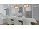 Kitchen features an island, stainless steel appliances, and stylish pendant lighting at 1120 Terrace Lake Rd, Columbus, IN 47201